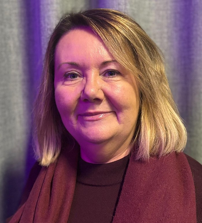 Bild på Ann-Charlotte. Hon har ljust hår.